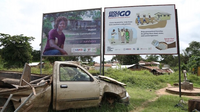 Billboards in Kakata in Margibi County, Liberia, where new Ebola cases were recorded in June and July 2015.