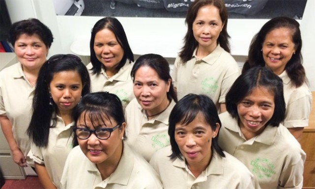 Judith Daluz (front row, right) poses with her fellows in the Damayan Cleaning Cooperative. Photo courtesy of Damayan Cleaning Cooperative.